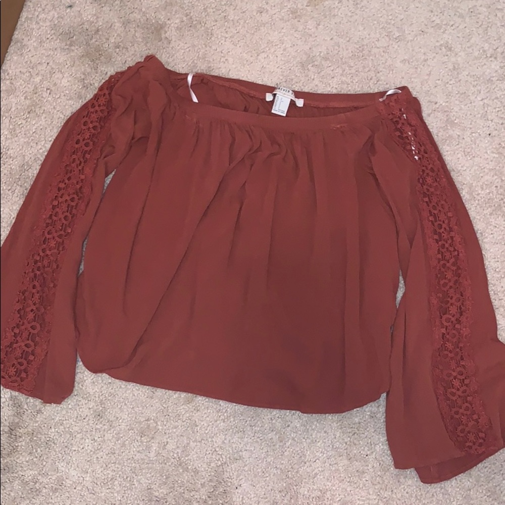 off the shoulder top with lace design on sleeves